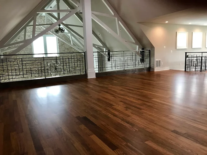 Vaulted great room with wood beams, finished by True North Craftsmen in Hamilton County